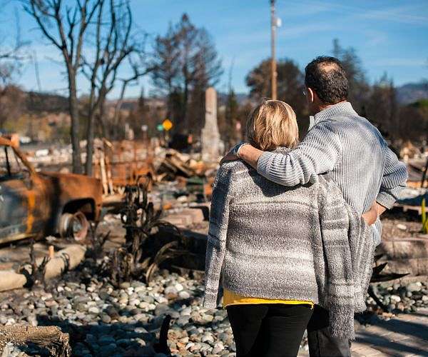 Greeks count cost of wildfire 'tragedy' near Athens; Massive French wildfire contained but 'not under control'