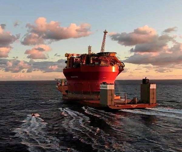 Greenpeace activists occupy vessel carrying Shell oil platform