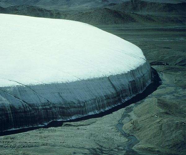 Third pole darkening affects local and remote climates