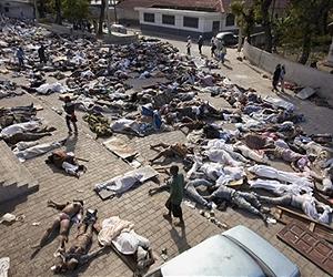 Corpses ignored as Haitians scramble for loot