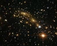 New mass map of a distant galaxy cluster is the most precise yet