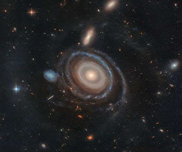 New survey charts hundreds of satellite galaxies orbiting dwarfs