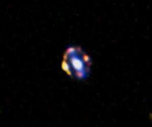 Most distant gravitational lens helps weigh galaxies