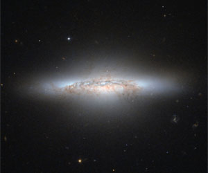 Hubble Spots a Colorful Lenticular Galaxy