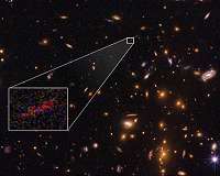 Great Observatories Team Up to Find Magnified and Stretched Image of Distant Galaxy