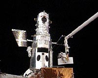 US astronauts equip Hubble on third spacewalk