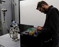 Why humans find faulty robots more likeable