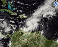 Ferocious Hurricane Omar swirls out to sea