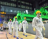 Fukushima operator eyes plan to clean up plant