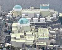Japan court halts nuclear reactor restart citing volcano, quake risks