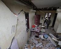 Rescuers scrabble for survivors as Indonesia quake kills 97