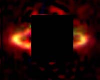 Red Dust In Planet-Forming Disk May Harbor Precursors To Life