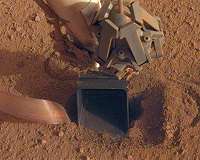NASA's InSight Flexes Its Arm While Its 'Mole' Hits Pause