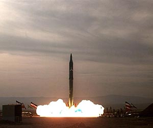 Iran parades 30 2,000 km range missiles