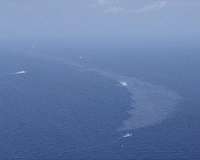 Oil slick off China coast trebles in size
