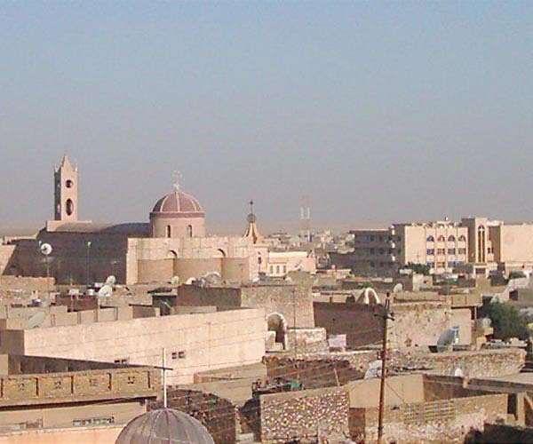 As Iraq concrete jungle swelters, ancient stone houses stay cool