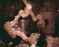 Spacewalkers begin Canadian robot assembly