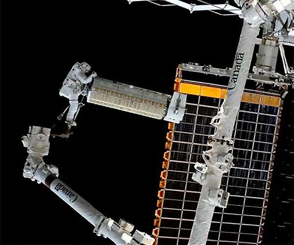 Astronauts use spacewalk to continue upgrade of ISS solar arrays