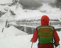 Italy avalanche toll at 15 as helicopter crash adds to pain