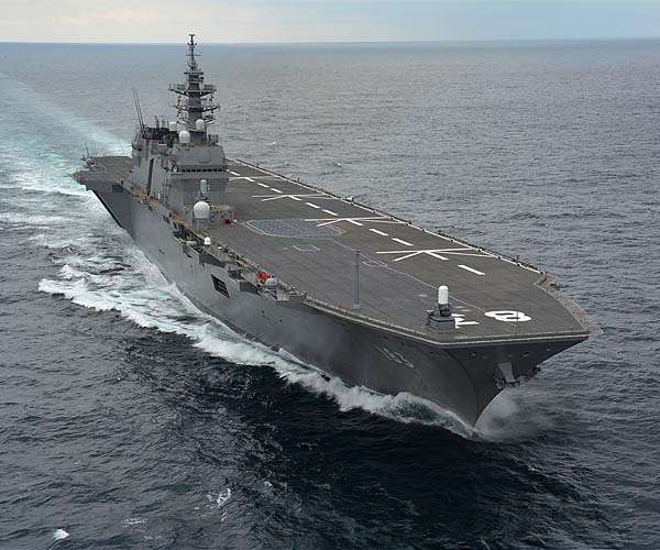 Japan cabinet approves record budget, higher defence spending