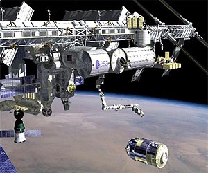 Japanese cargo craft docks with ISS