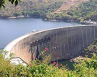 Zambia and Zimbabwe open dam spillway gate