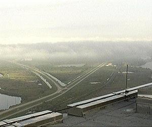 Bad Weather Delays Shuttle Landing One Day