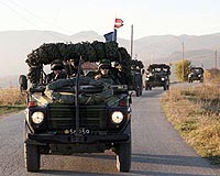 NATO warns Afghan support at risk without troop status accord