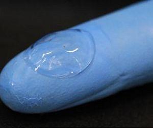 Stretchable, transparent graphene-metal nanowire electrode