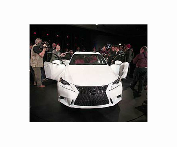 Climate activists target sports cars at Paris motor show