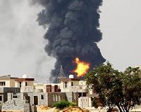 Nearly 40 killed in air strike on Libya migrant centre