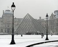 Snowboards out as Paris gets first taste of snow