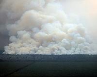 Indonesians choked by forest fire haze pray for rain