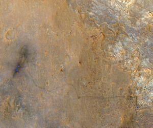 Curiosity Mars Rover Gleams in View from Orbiter
