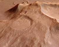 Martian Crater Features Suggest Influence Of Water And Ice