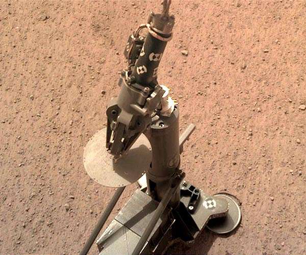 NASA engineers checking InSight's weather sensors