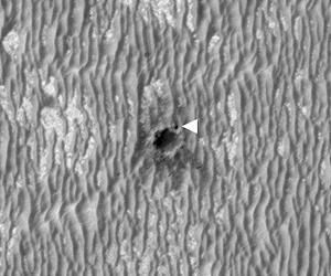 Investigating Material Ejected From Young Crater
