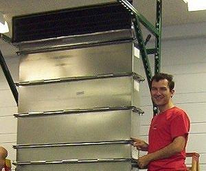 Improving the physics of grocery store display cases to save energy