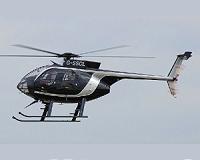 MD 530G attack helicopters fires Talon rockets