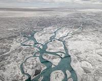 Greenland's ice is getting darker, increasing risk of melting