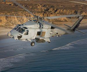 US Navy searches for 2 sailors after chopper crash