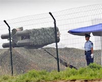 Olympics: China deploys missiles to guard Games