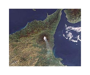 Italy volcano eruption dies down, airport re-opens