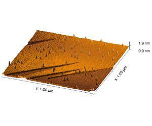 Nano-hillocks: Of mountains and craters