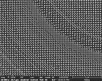 Broadband achromatic metalens focuses light regardless of polarization