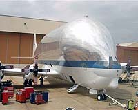 NASA Super Guppy Plane Delivers Large Composite Structure for Testing