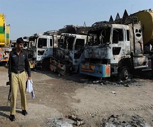 One dead as at least 10 NATO tankers torched in Pakistan