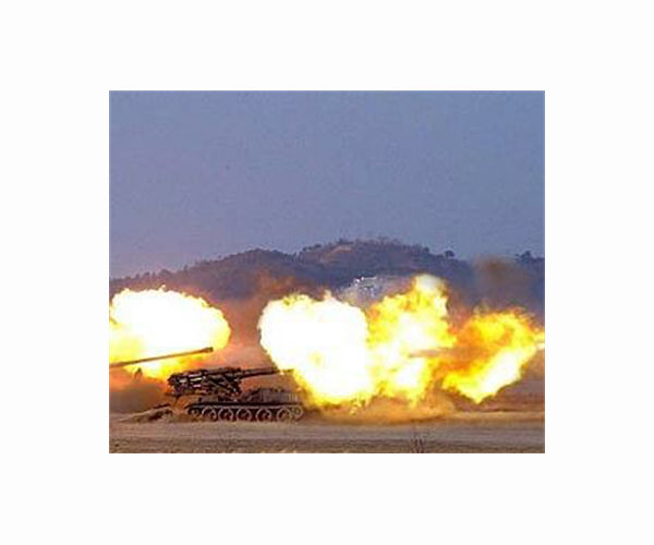 North Korea fires artillery barrage into buffer zone: Seoul
