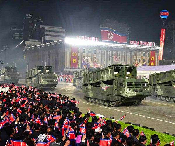North Korea reports holding 'grand' military parade