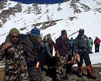Nepal hospitals overflowing, rural towns cut off: aid groups